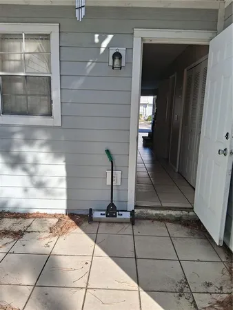 a view of backyard of the house