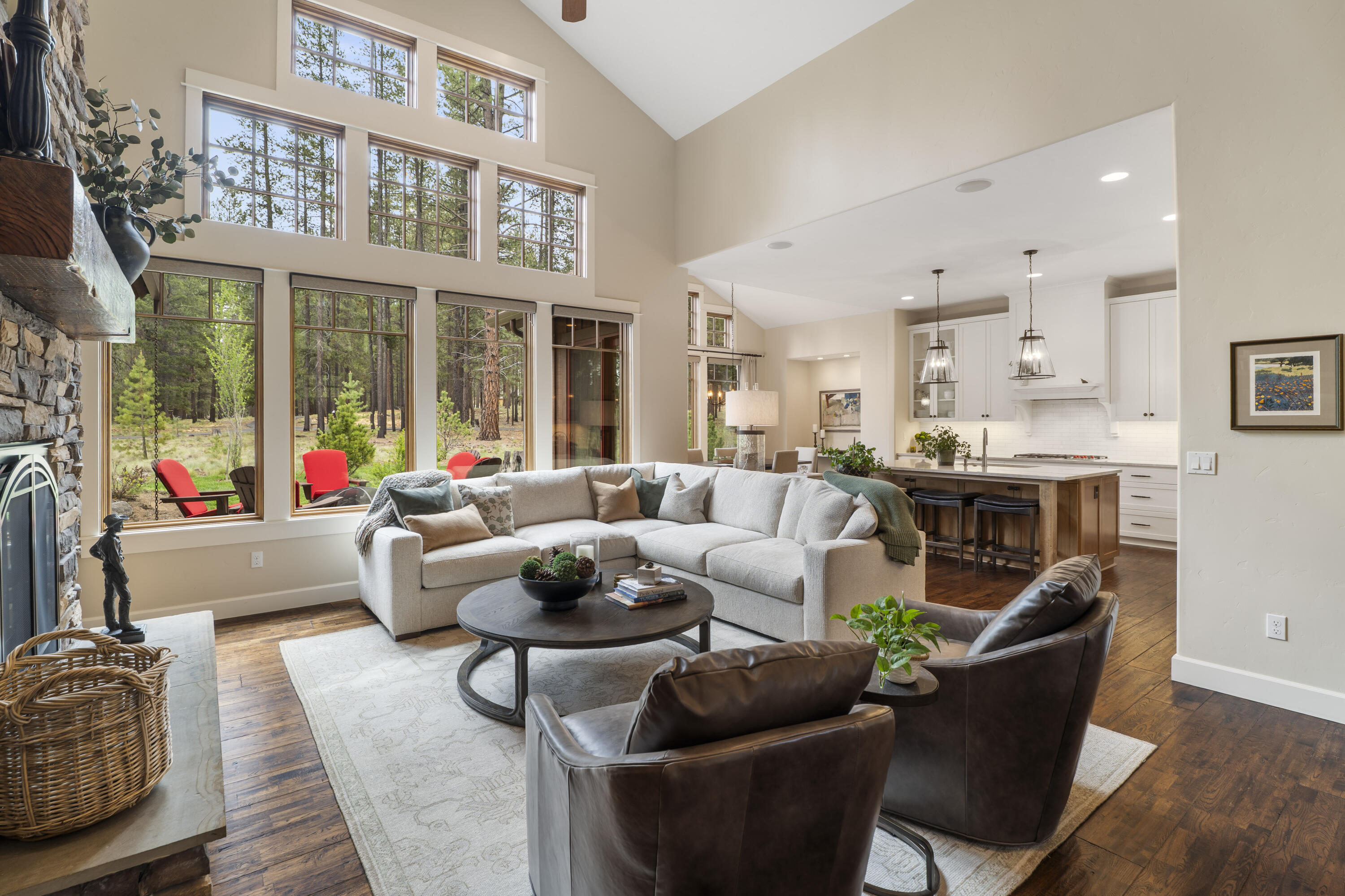 56155 Sable Rock Loop, Unit 277 Bend, OR 97707 - Photo 6 of 63 The open-concept great room and kitchen showcase walls of windows, vaulted ceilings, and elegant finishes designed for comfortable luxury living.