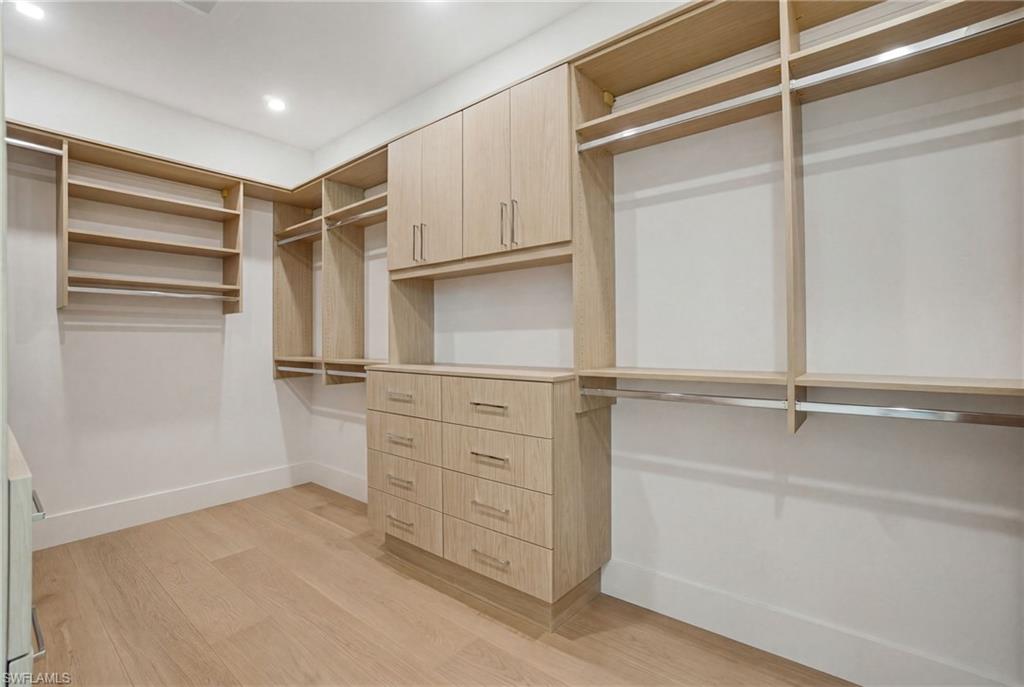 264 8th Avenue South Naples, FL 34102 - Photo 14 of 40 a view of an empty walk in closet