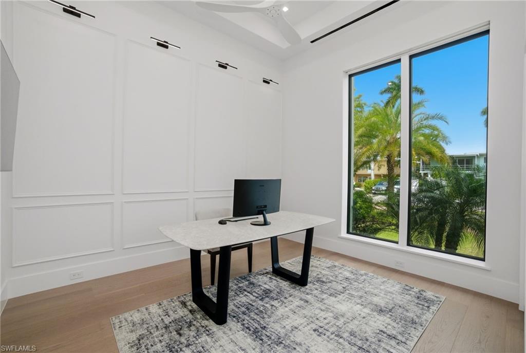 264 8th Avenue South Naples, FL 34102 - Photo 15 of 40 a view of a workspace with a window