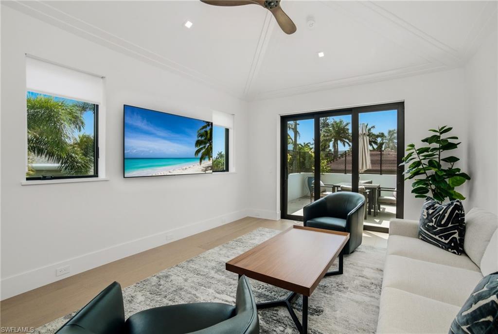 264 8th Avenue South Naples, FL 34102 - Photo 26 of 40 a living room with furniture