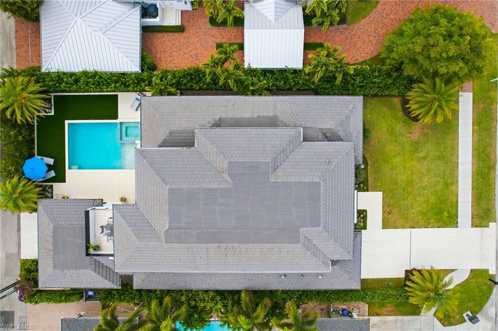 264 8th Avenue South Naples, FL 34102 - Photo 38 of 40 an aerial view of a house with a garden