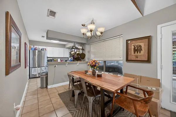 a view of a dining room with furniture
