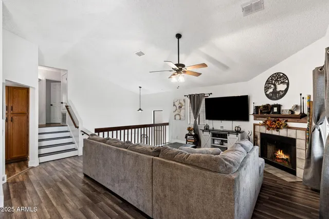 a kitchen with stainless steel appliances a sink a stove and a microwave