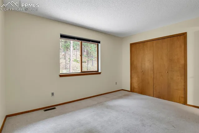 a bathroom with a sink a toilet a mirror a bathtub and shower