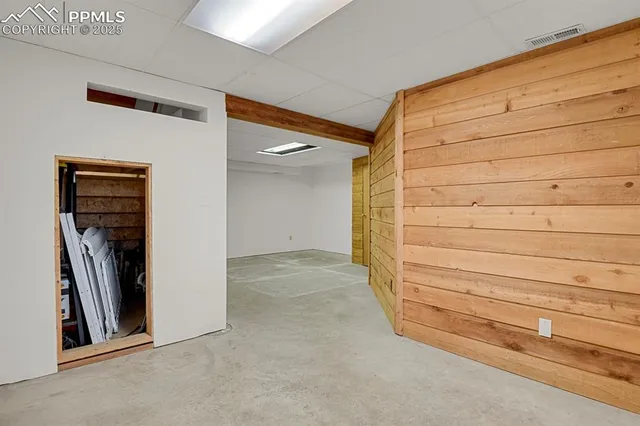 a view of swimming pool with a patio