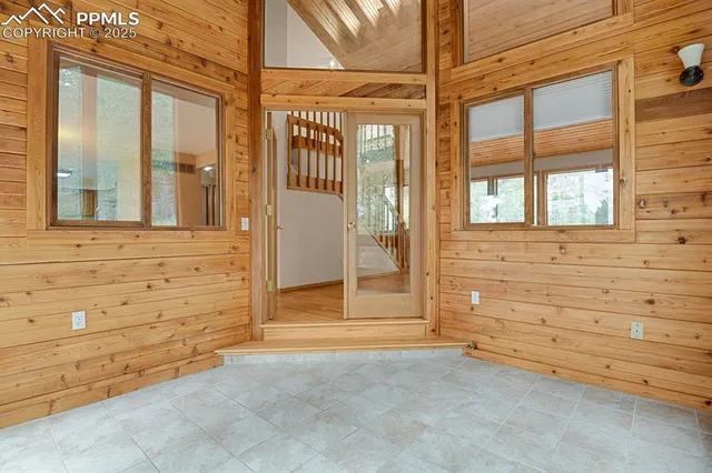a view of an entryway with a chandelier
