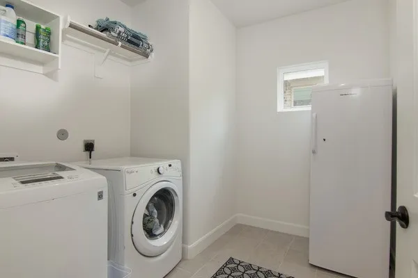 a view of a house with a swimming pool and a yard