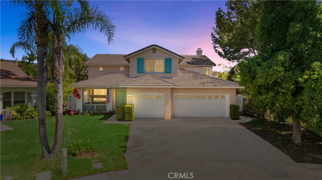 31680 Sebastiani Circle Temecula, CA 92591 - Photo 1 of 1 a front view of a house with a yard and garage