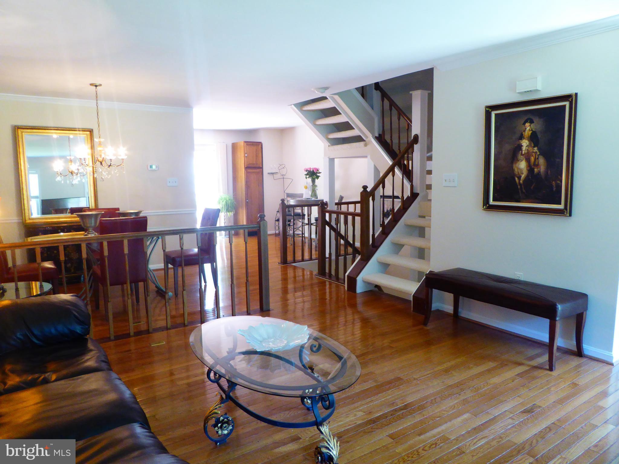 11947 Sentinel Point Court Reston, VA 20191 - Photo 3 of 27 Front Door Opens Up to Foyer and Living Room