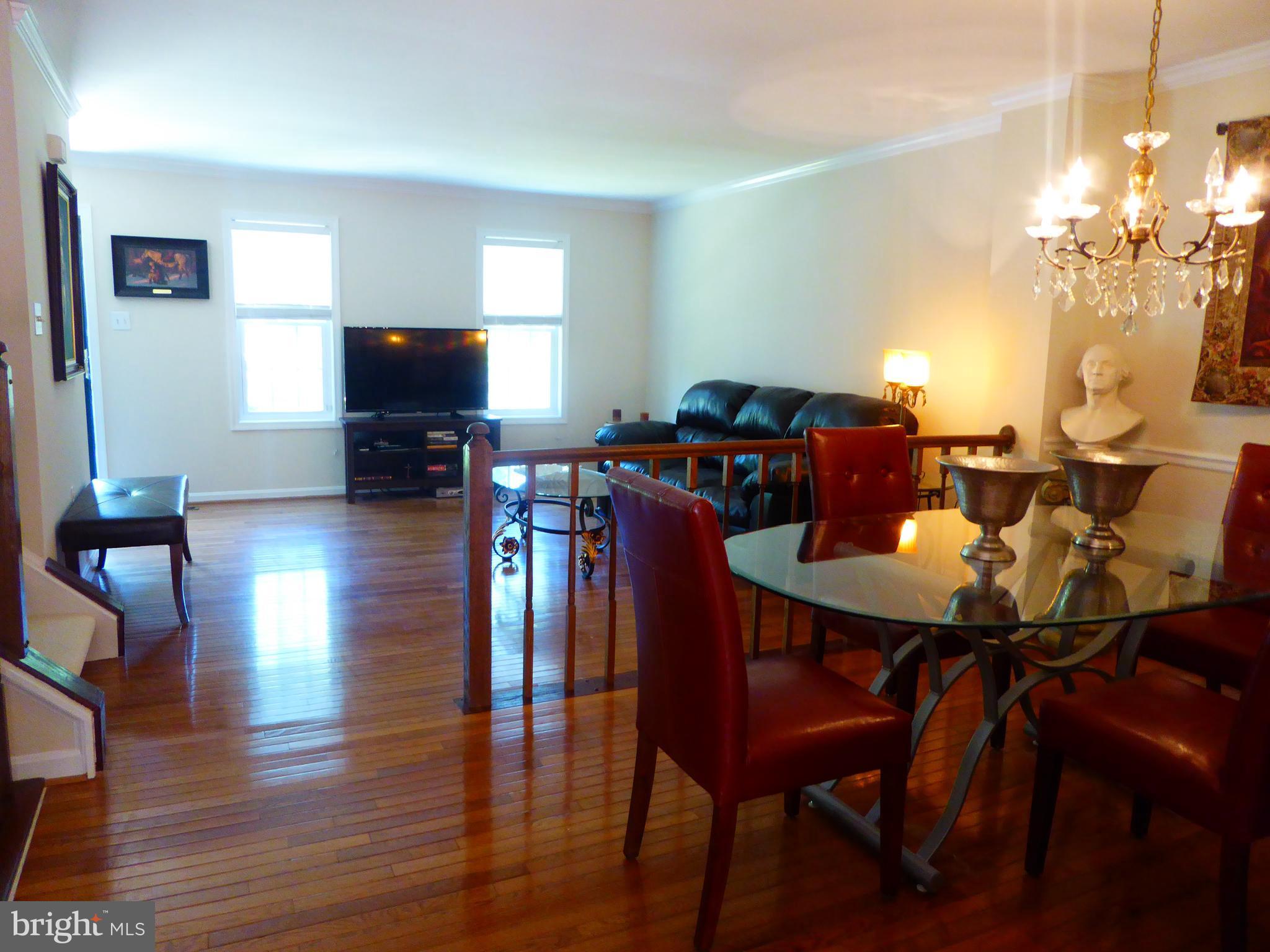 11947 Sentinel Point Court Reston, VA 20191 - Photo 5 of 27 Living Room Facing the Front Courtyard