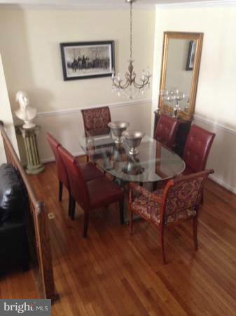 11947 Sentinel Point Court Reston, VA 20191 - Photo 6 of 27 Dining Area Opens Up to the Living Room
