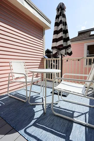 a backyard of a house with seating space