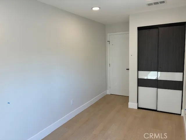 a view of empty room with windows