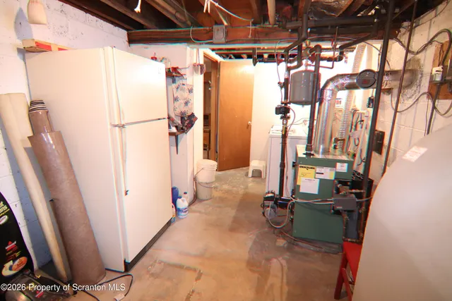 a view of storage and utility room