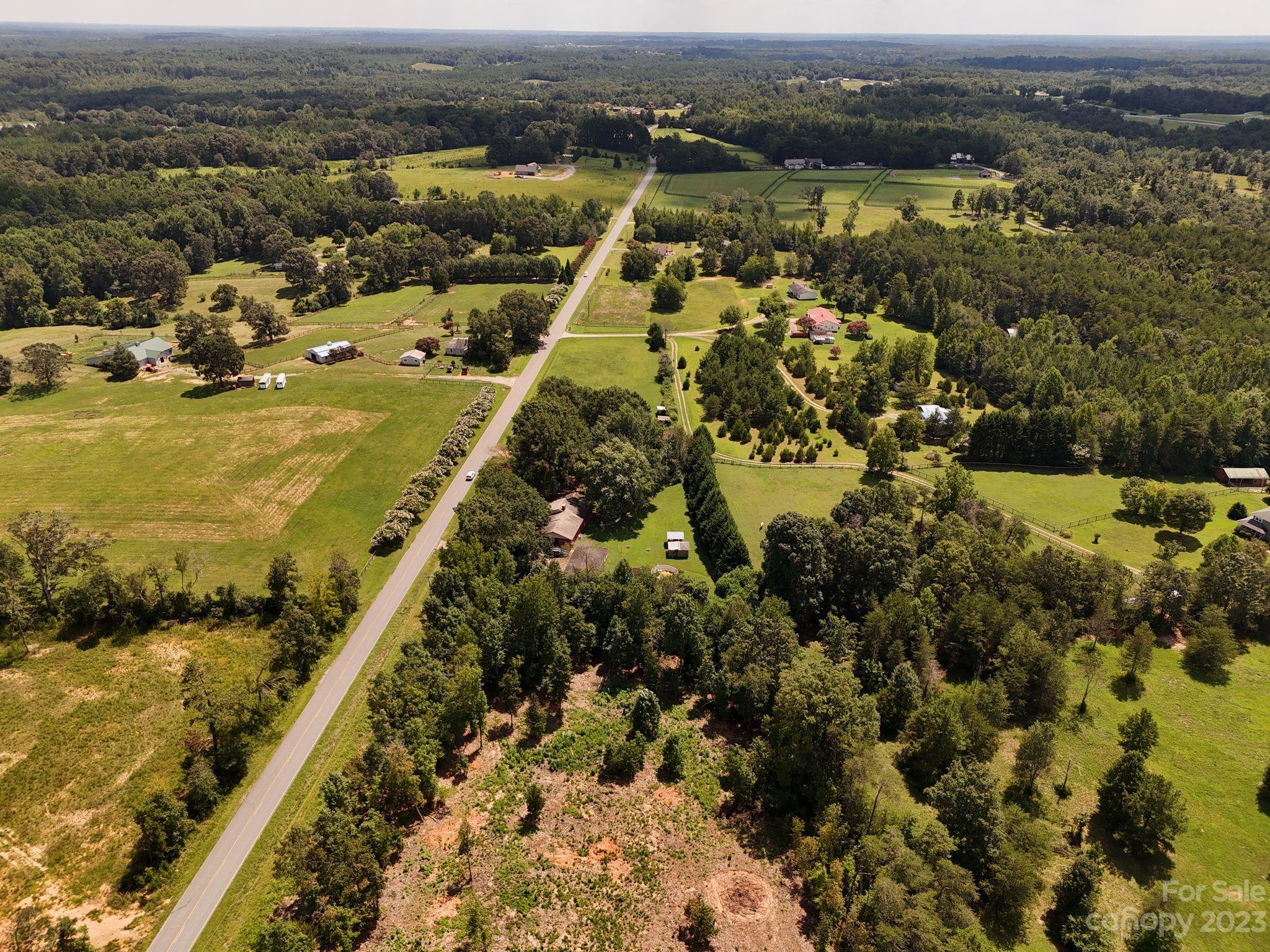Lot 4 Poors Ford Road, Unit 4 Tryon, NC 28782 - Photo 19 of 19 an aerial view of residential houses with outdoor space