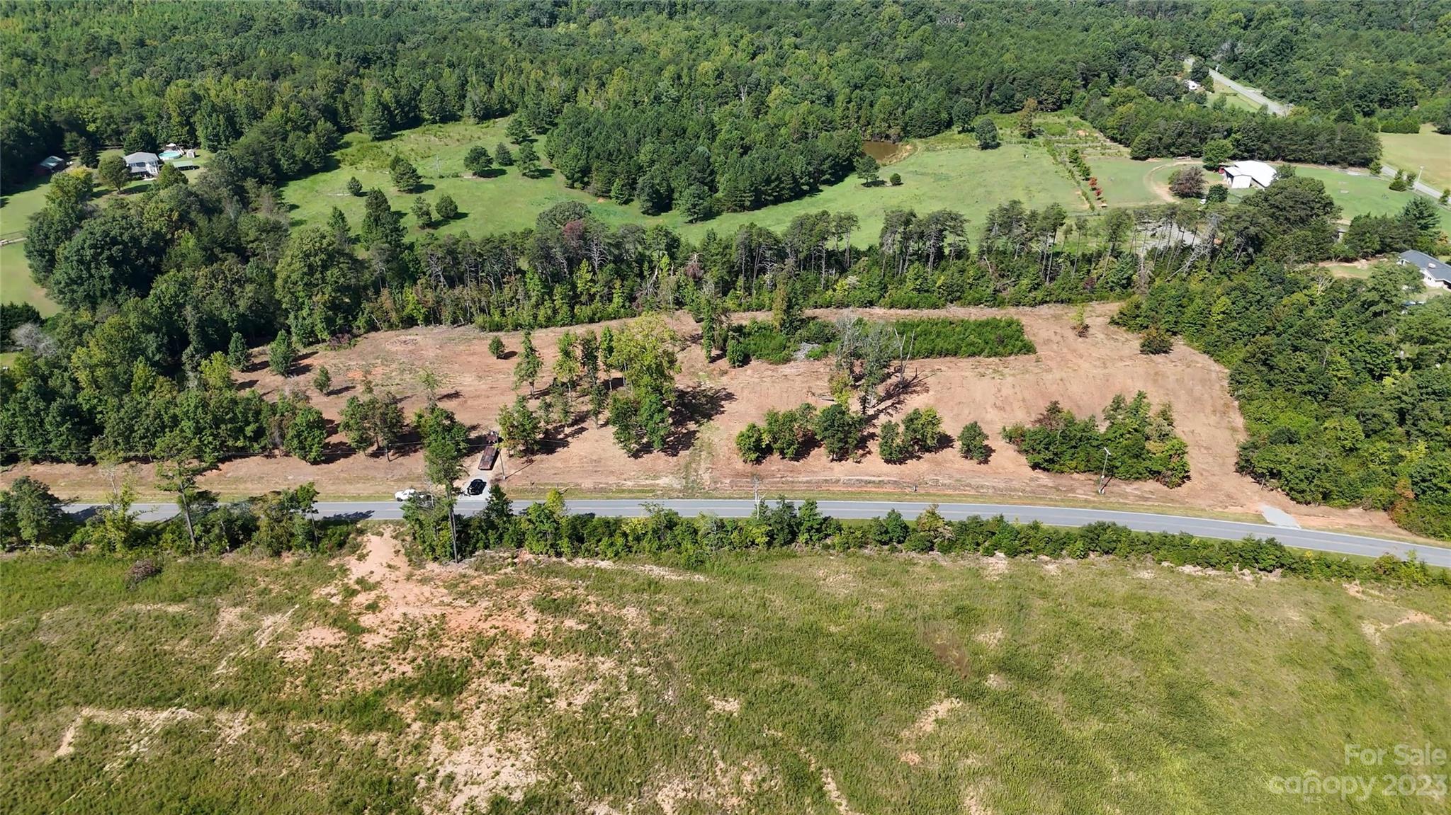 Lot 4 Poors Ford Road, Unit 4 Tryon, NC 28782 - Photo 4 of 19 a view of a yard with a garden
