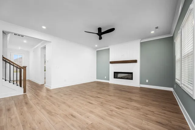 a view of a kitchen with a sink and a stove top oven