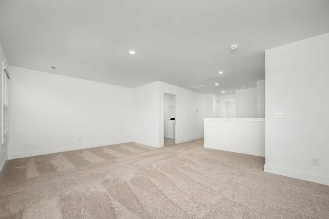 a view of storage and utility room with washer and dryer
