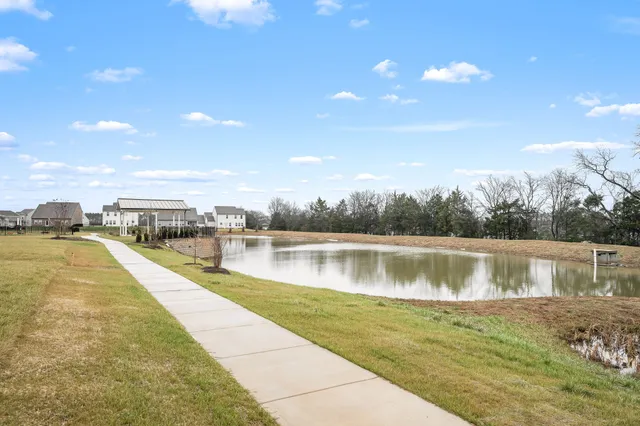 a view of a patio with a yard