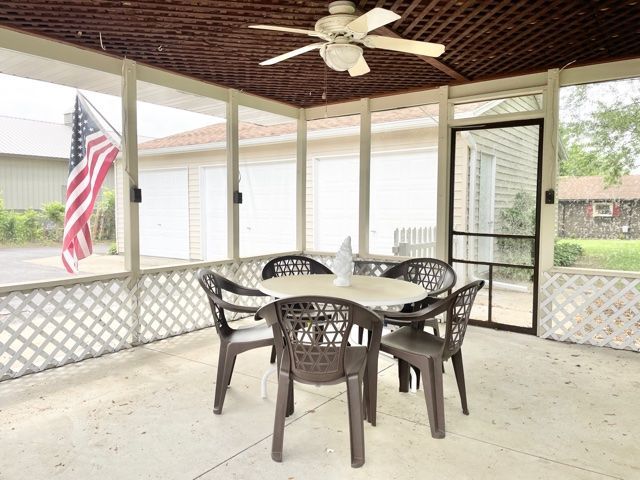 1028 Franklin Grove Road Dixon, IL 61021 - Photo 4 of 48 a view of a dining room with furniture window and outside view