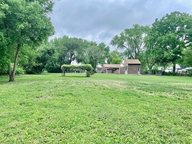 1028 Franklin Grove Road Dixon, IL 61021 - Photo 34 of 48 a house view with a sitting space and garden