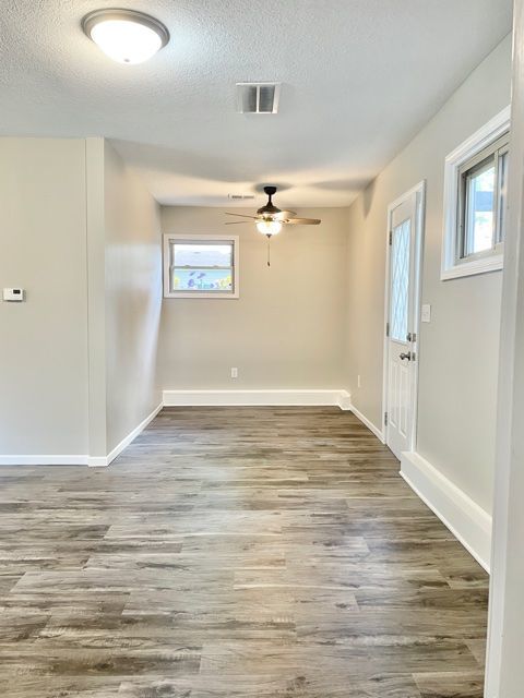 1028 Franklin Grove Road Dixon, IL 61021 - Photo 40 of 48 a view of a room with wooden floor