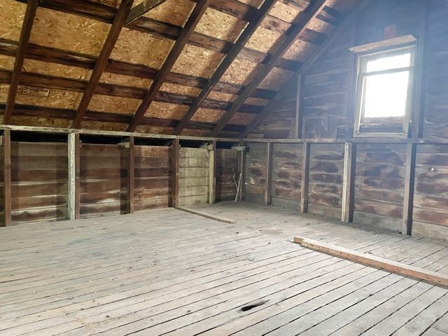1028 Franklin Grove Road Dixon, IL 61021 - Photo 47 of 48 a view of an empty room with wooden floor