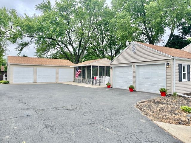 1028 Franklin Grove Road Dixon, IL 61021 - Photo 6 of 48 a view of a house with street