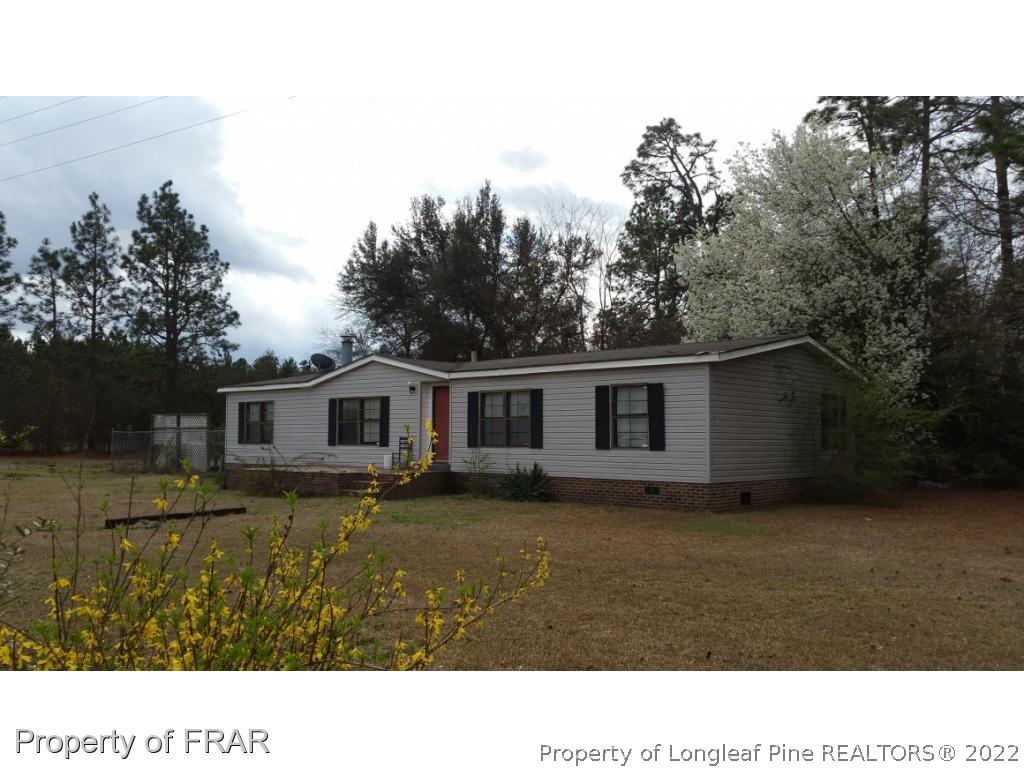 110 Tc Jones Road Raeford, NC 28376 - Photo 3 of 10 a house view with a garden space