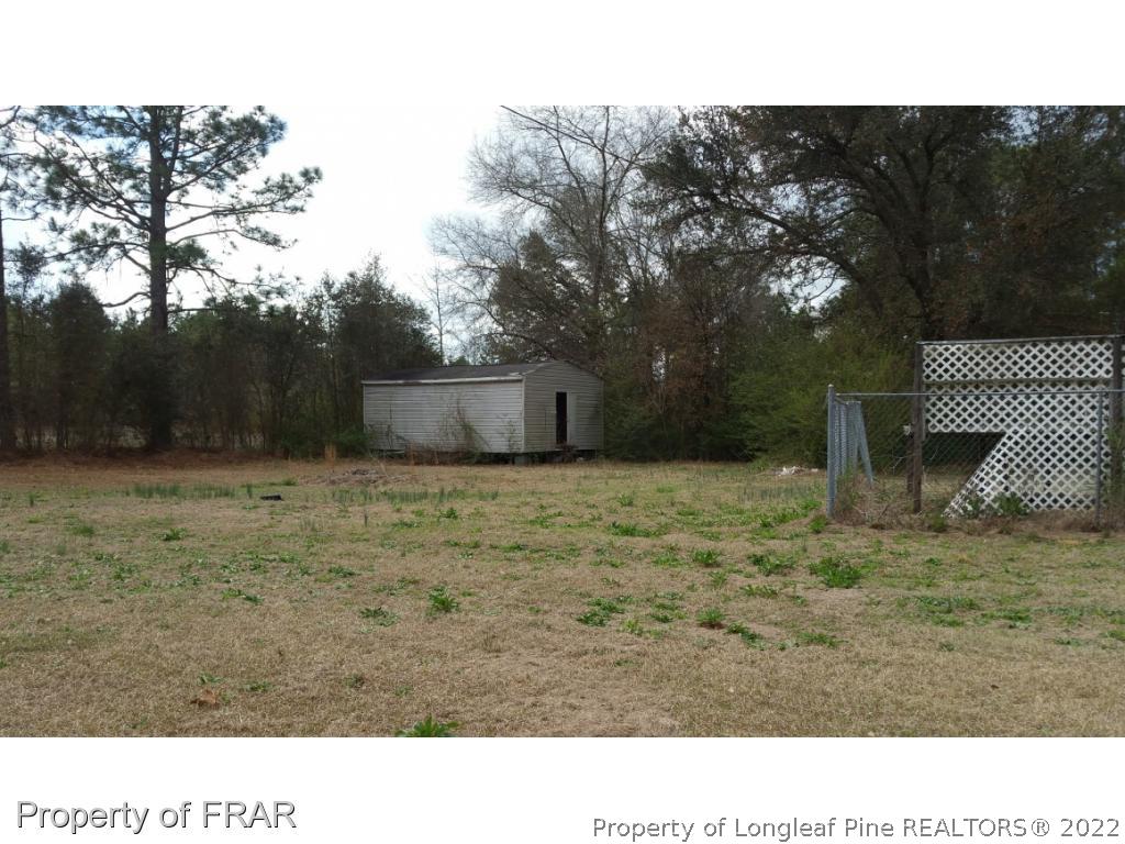 110 Tc Jones Road Raeford, NC 28376 - Photo 7 of 10 a open area with trees in the background