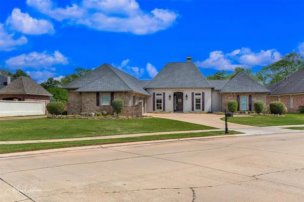 a house with garden in front of it