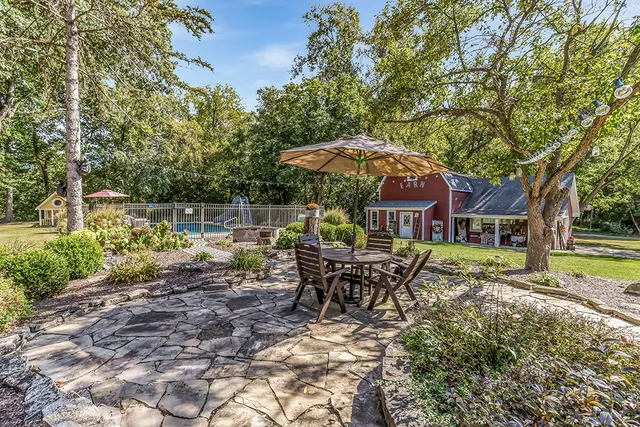 a view of a field with trees