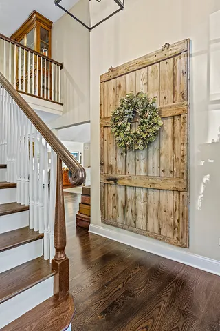 a kitchen with stainless steel appliances kitchen island granite countertop a sink and cabinets