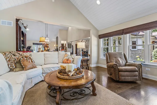 a kitchen with a sink cabinets and window