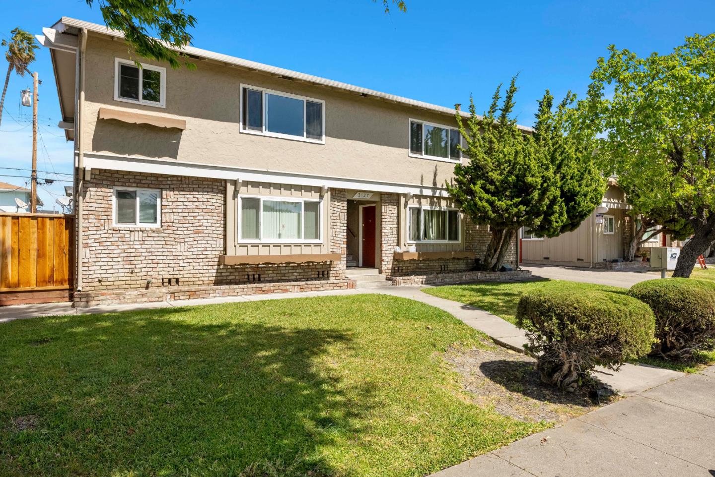 2127 Monroe Street Santa Clara, CA 95050 - Photo 1 of 25 a swimming pool with outdoor seating and yard