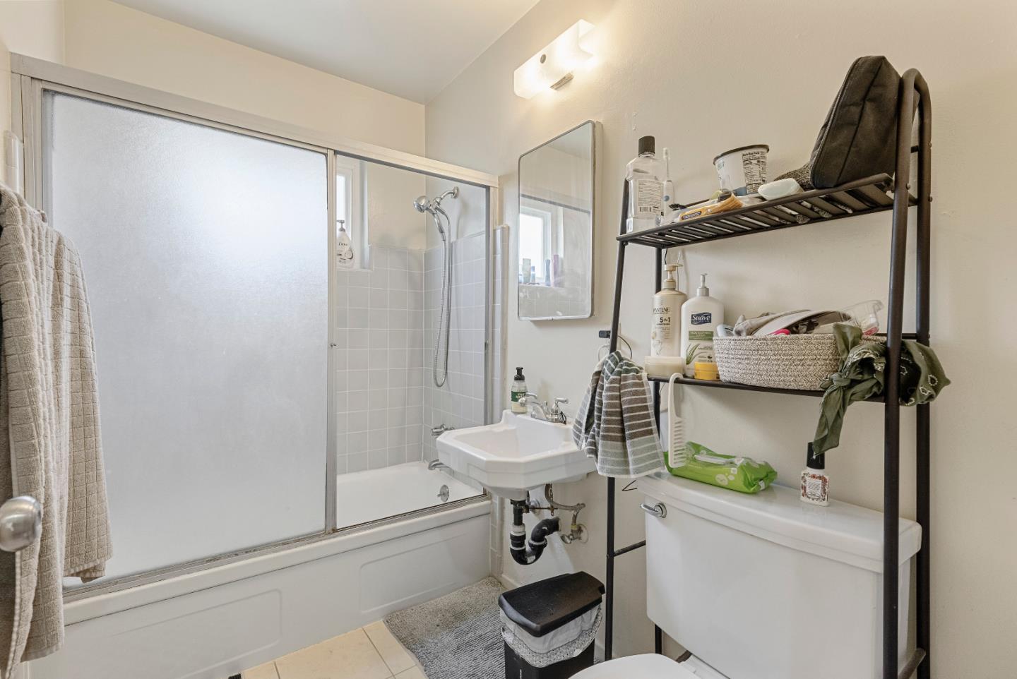 2127 Monroe Street Santa Clara, CA 95050 - Photo 11 of 25 a bathroom with a sink toilet and shower