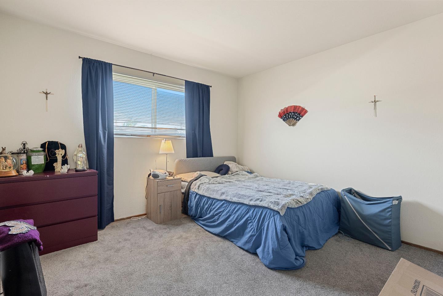 2127 Monroe Street Santa Clara, CA 95050 - Photo 12 of 25 a bed sitting in a bedroom next to a window and dresser