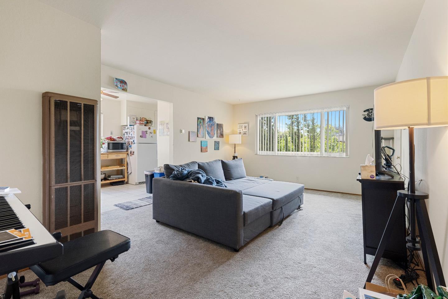 2127 Monroe Street Santa Clara, CA 95050 - Photo 2 of 25 a living room with furniture and a flat screen tv