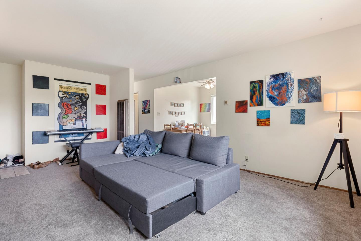 2127 Monroe Street Santa Clara, CA 95050 - Photo 3 of 25 a living room with furniture and a flat screen tv