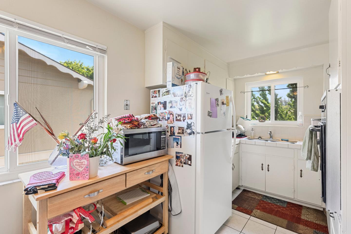 2127 Monroe Street Santa Clara, CA 95050 - Photo 7 of 25 a kitchen with refrigerator and stove