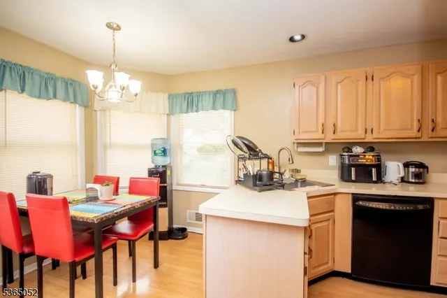 a kitchen that has a cabinets counter space and a stove