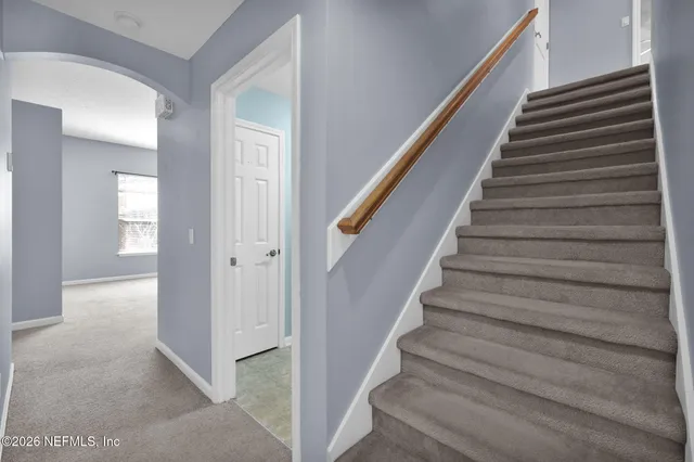 a view of entryway with wooden floor