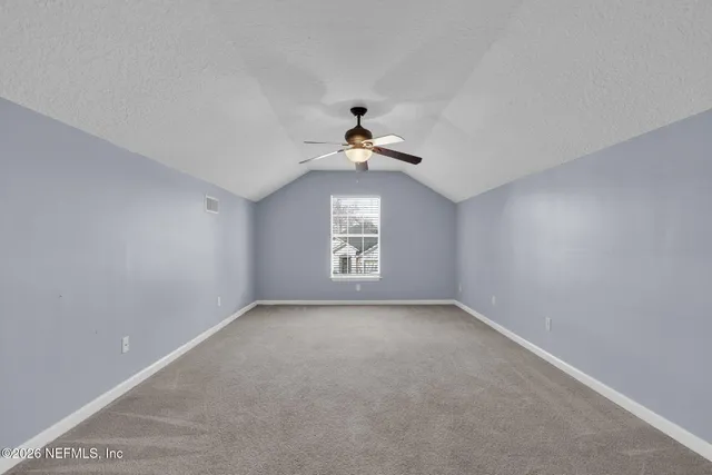 a view of entryway and hall with a window