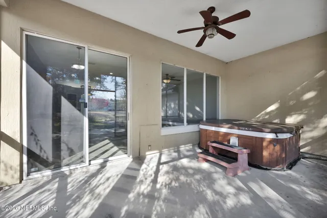 a room with bed and window