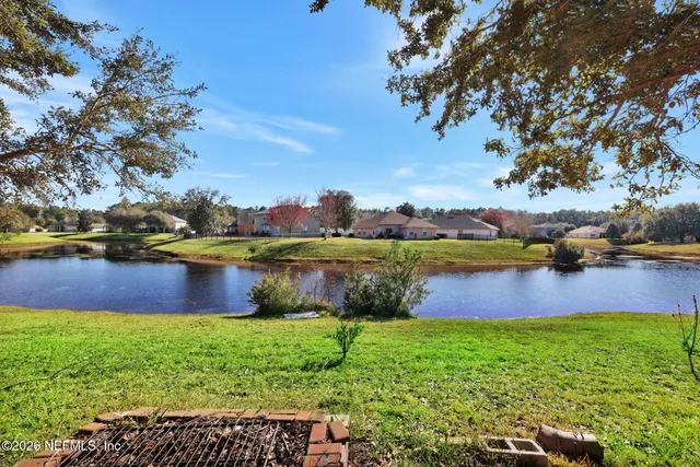 a view of lake with houses
