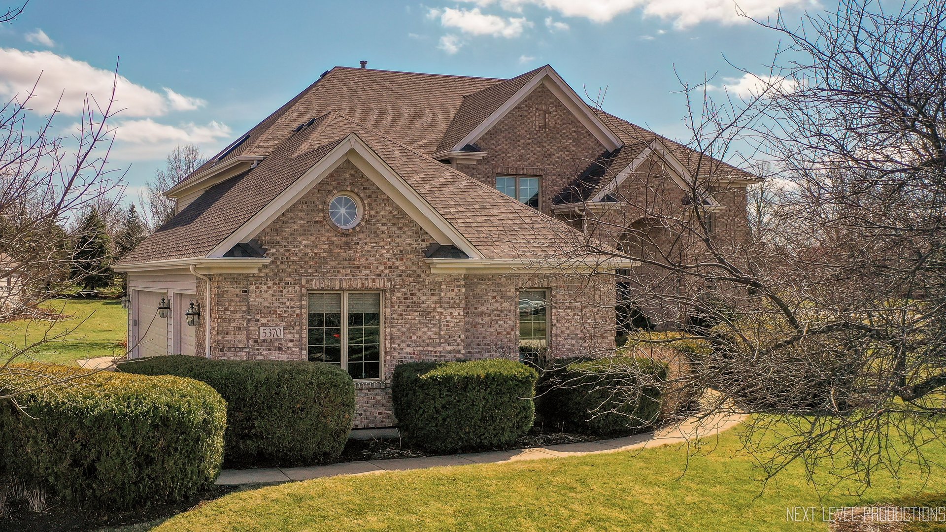 5370 Old Reserve Road Oswego, IL 60543 - Photo 1 of 48 a front view of a house with a yard