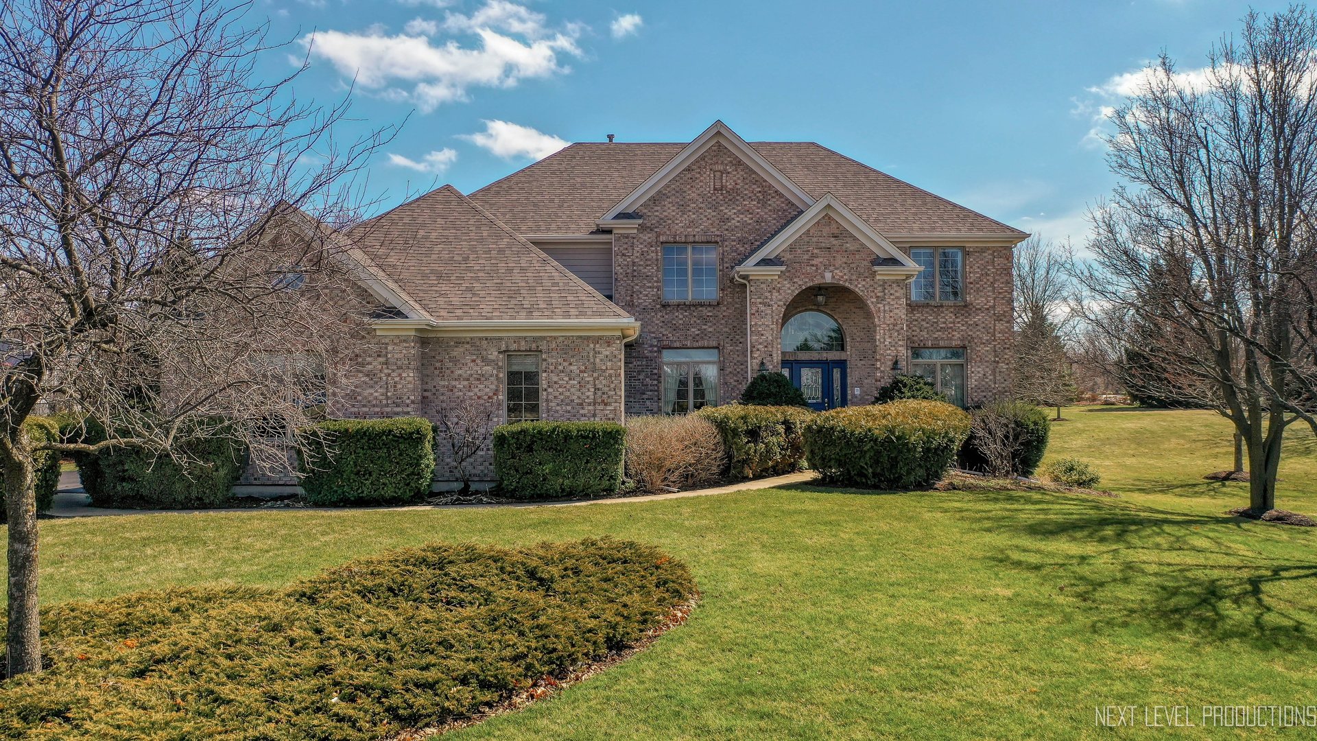 5370 Old Reserve Road Oswego, IL 60543 - Photo 2 of 48 a front view of a house with garden