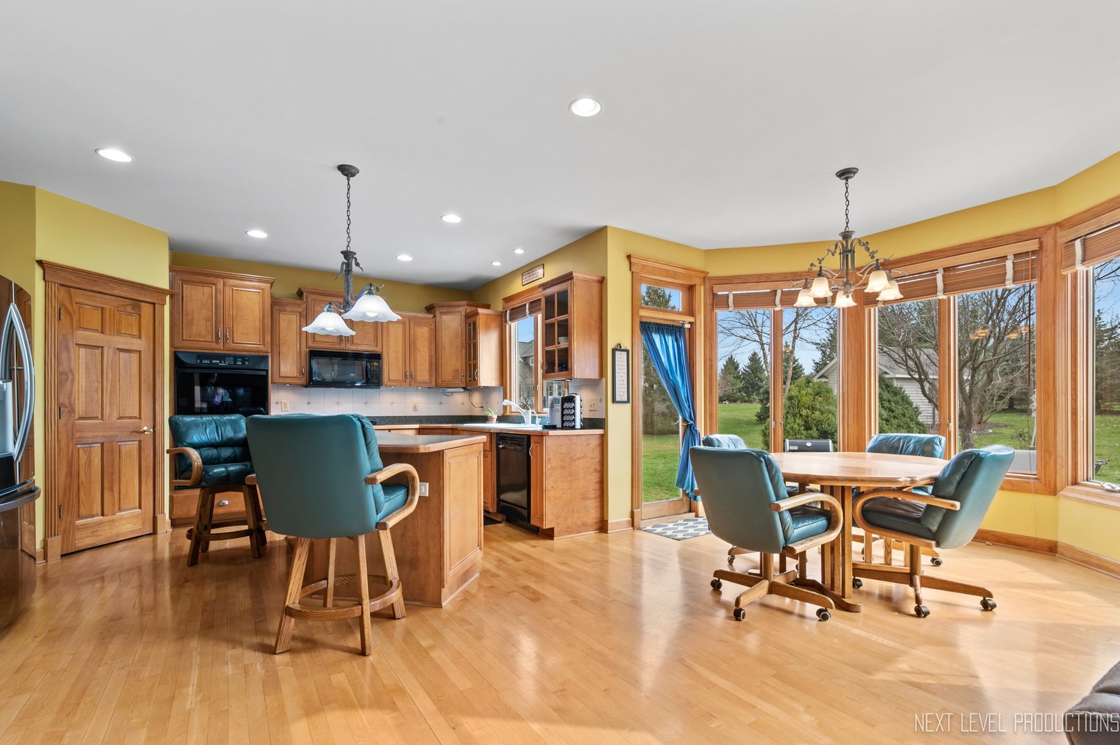 5370 Old Reserve Road Oswego, IL 60543 - Photo 21 of 48 a view of a dining room with furniture window and outside view