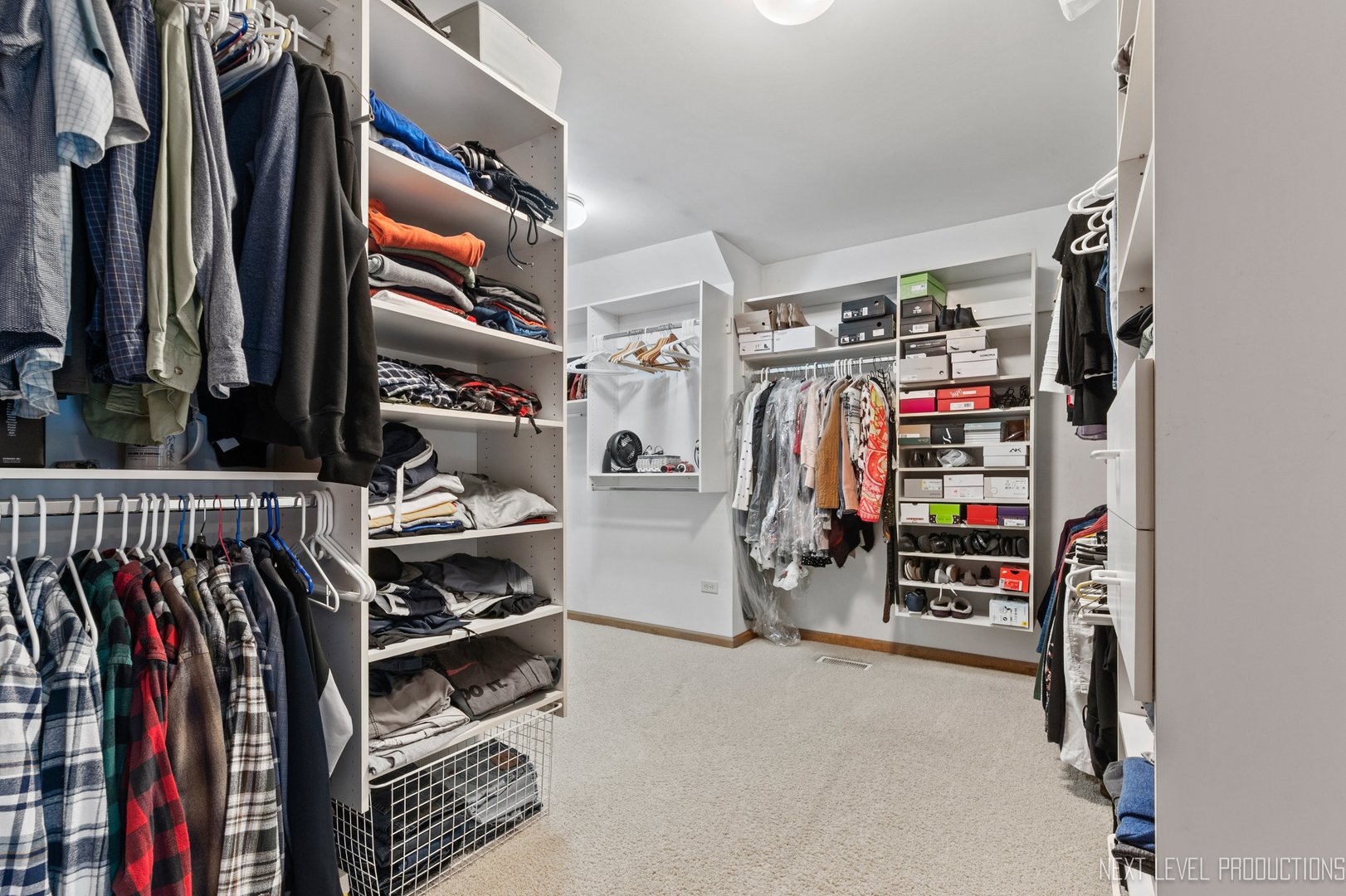 5370 Old Reserve Road Oswego, IL 60543 - Photo 33 of 48 a view of walk in closet with clothes and shoes